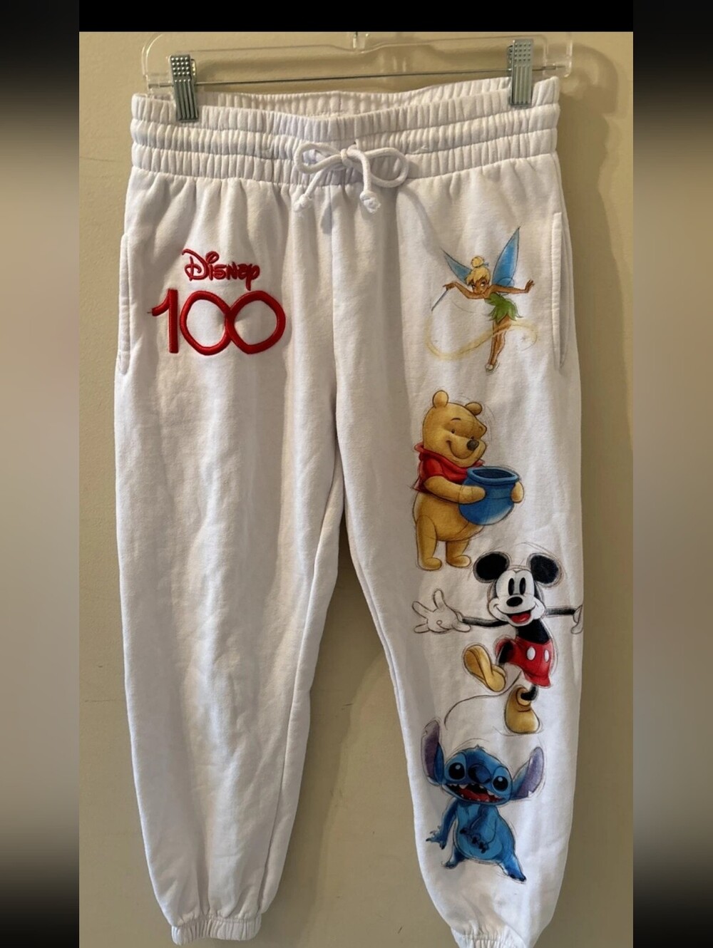 Disney White Kids Sweatpants with Red 100 Logo and Multicolor Character Prints